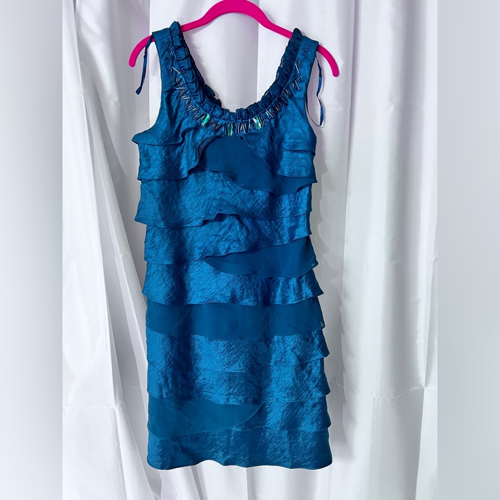 S.L. Fashions Teal Layered Sleeveless Dress with bejeweled neckline.